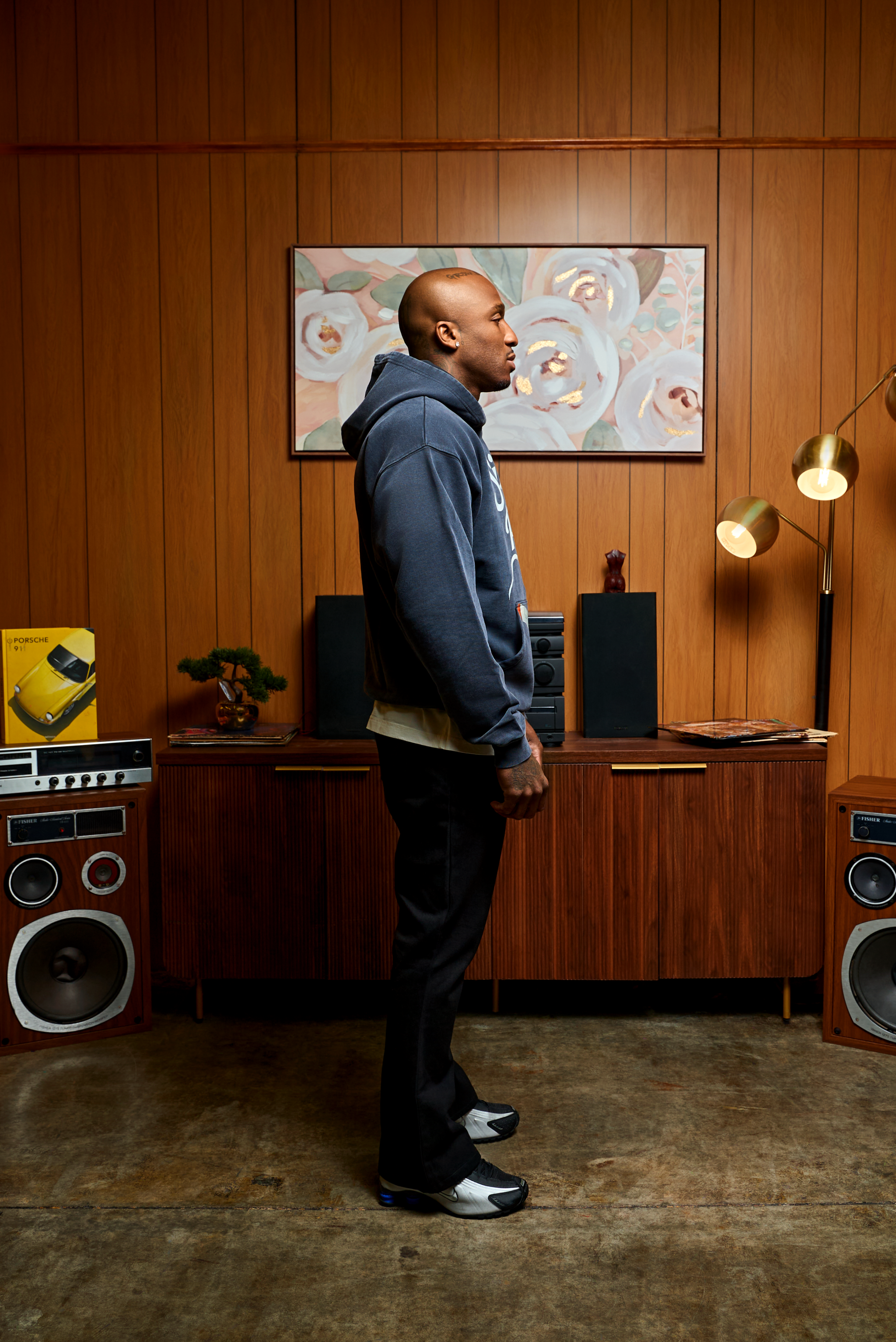 The Weight of Whispered Legends hoodie in black with bold front typography and relaxed fit