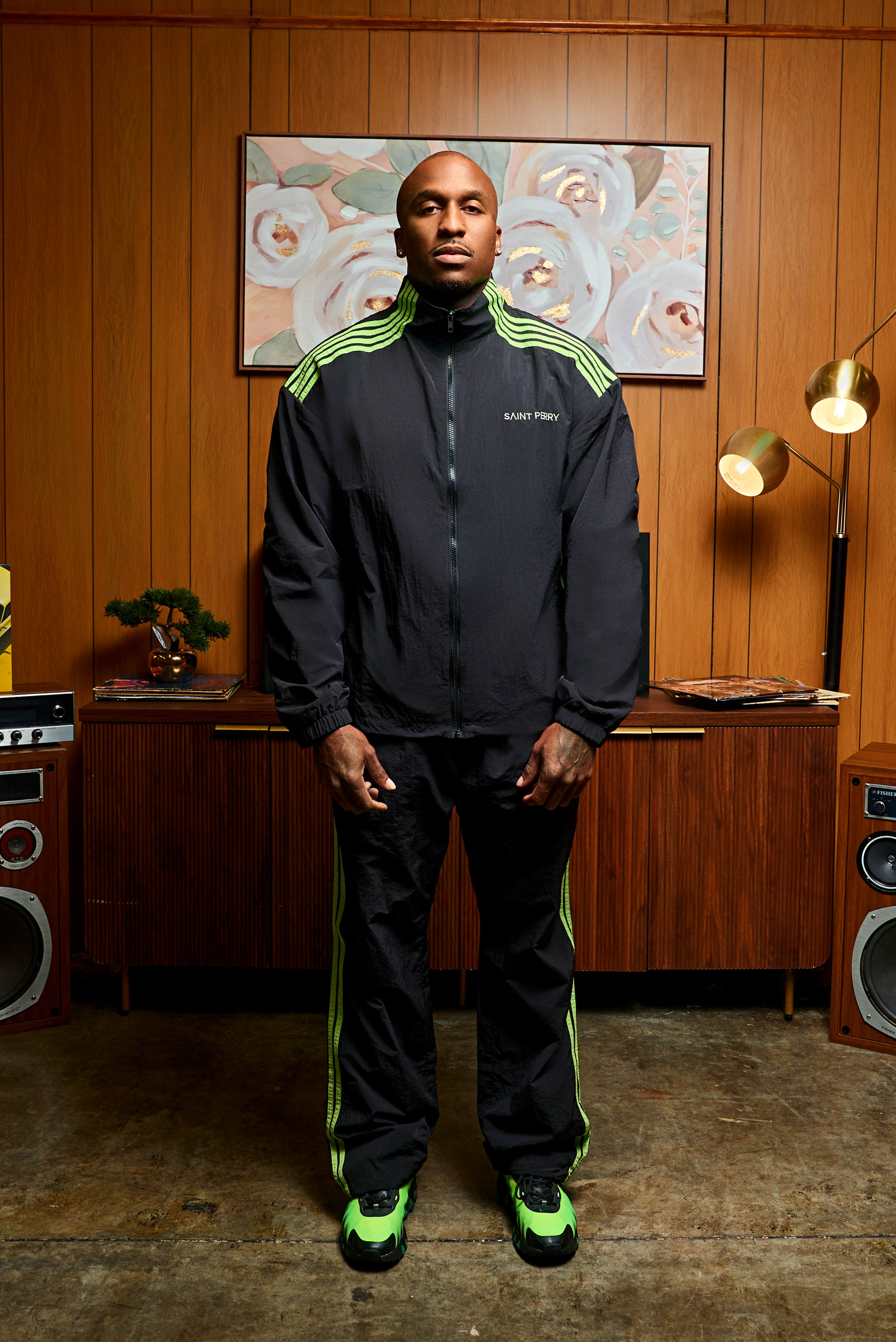 Black and neon green Otis Track Jacket and Pants set with tailored athletic fit and contrast paneling