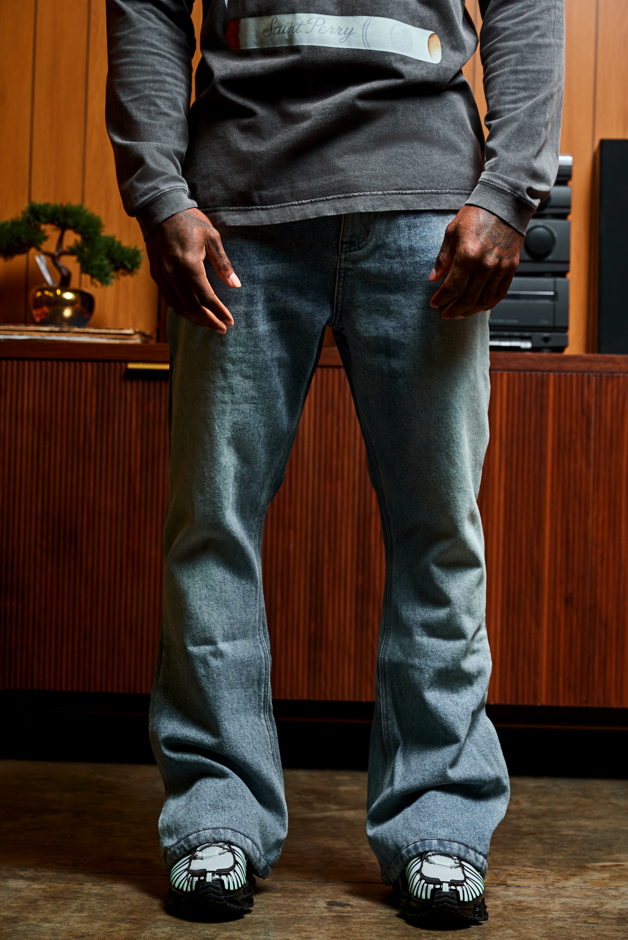 Angel Flare Denim Jeans in indigo blue with mid-rise, flare fit, silver-tone hardware, and contrast stitching