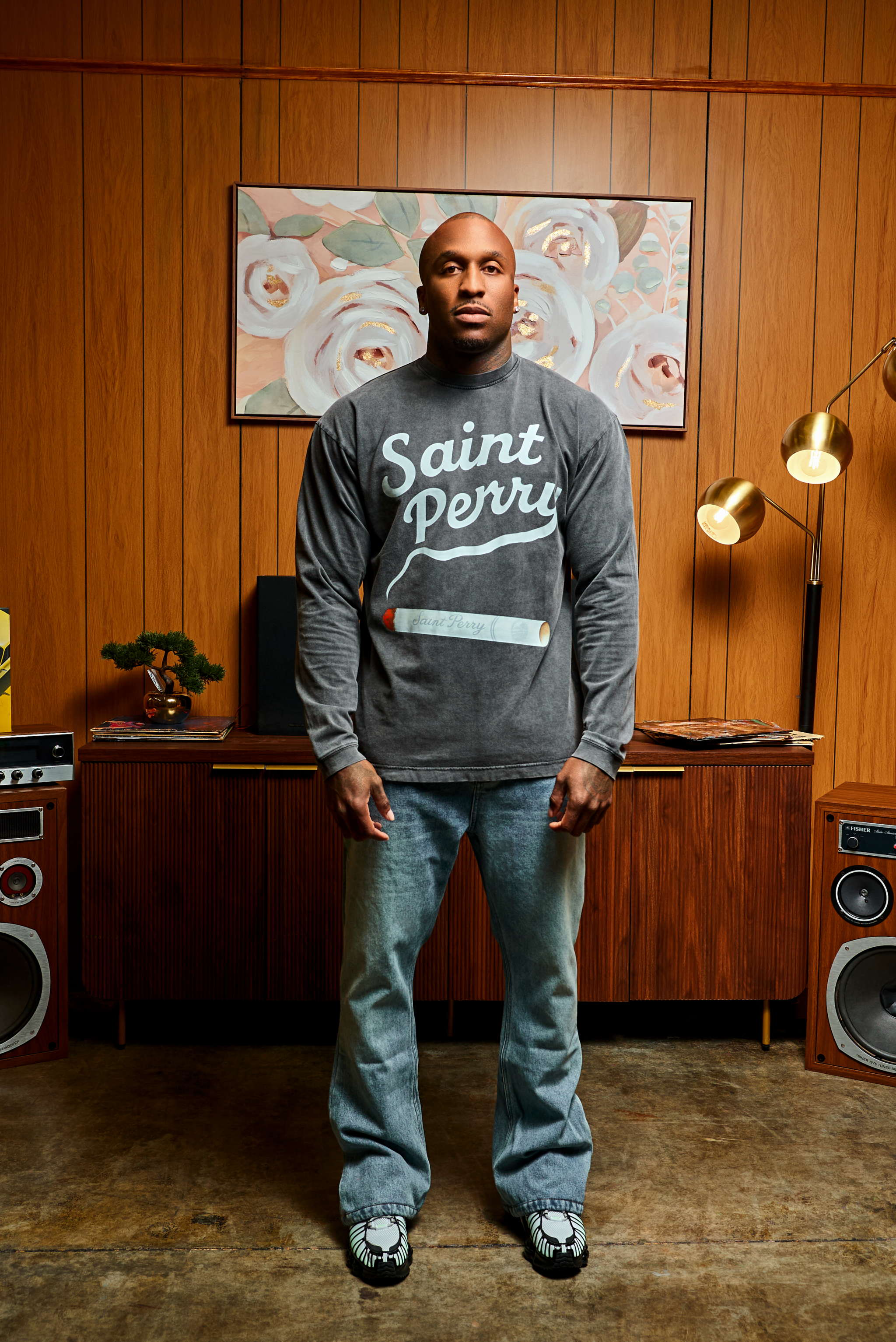 The Weight of Whispered Legends black long-sleeve shirt with bold front graphic and relaxed fit