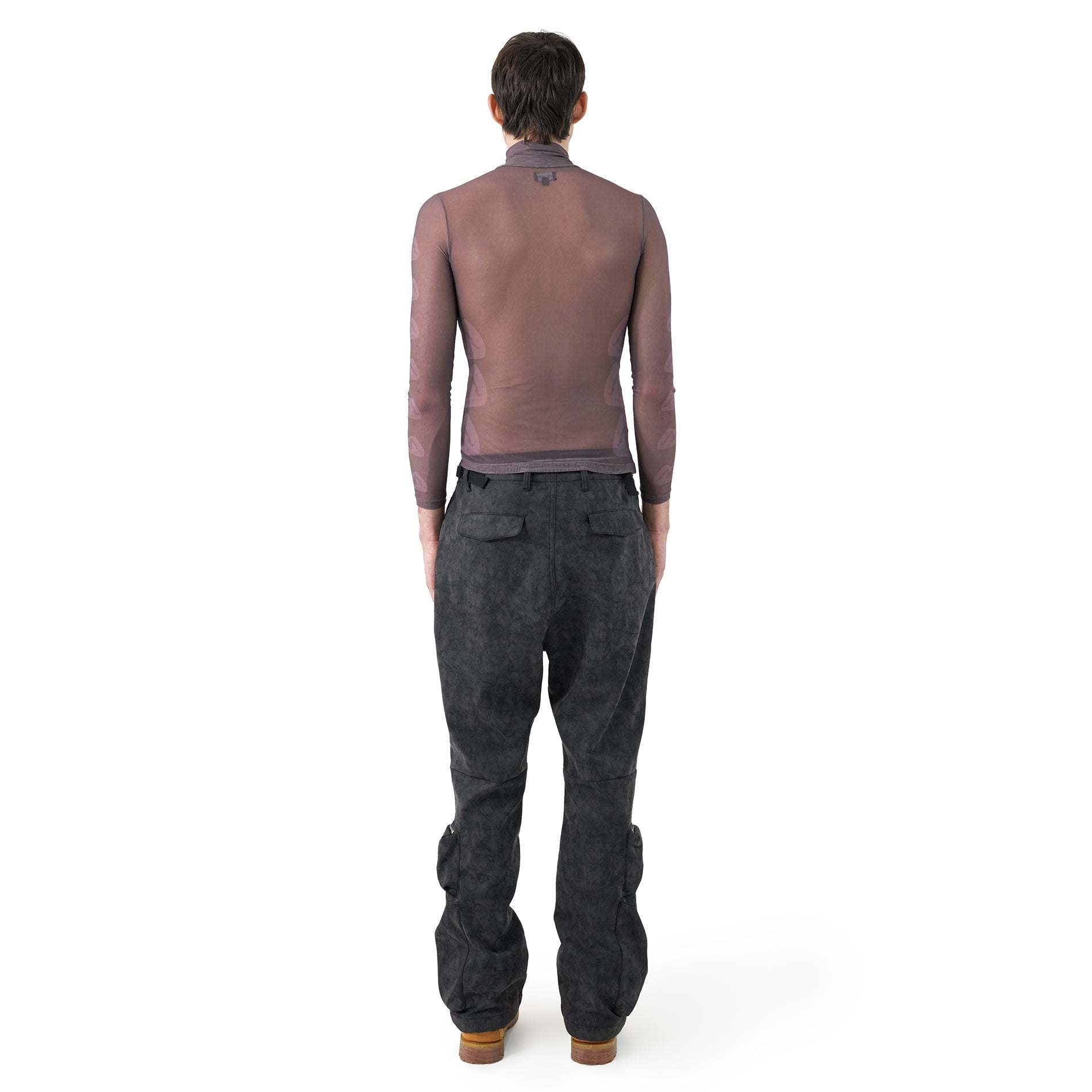Dark gray baggy cargo pants with exaggerated flap pockets and adjustable waist straps in suede cotton blend