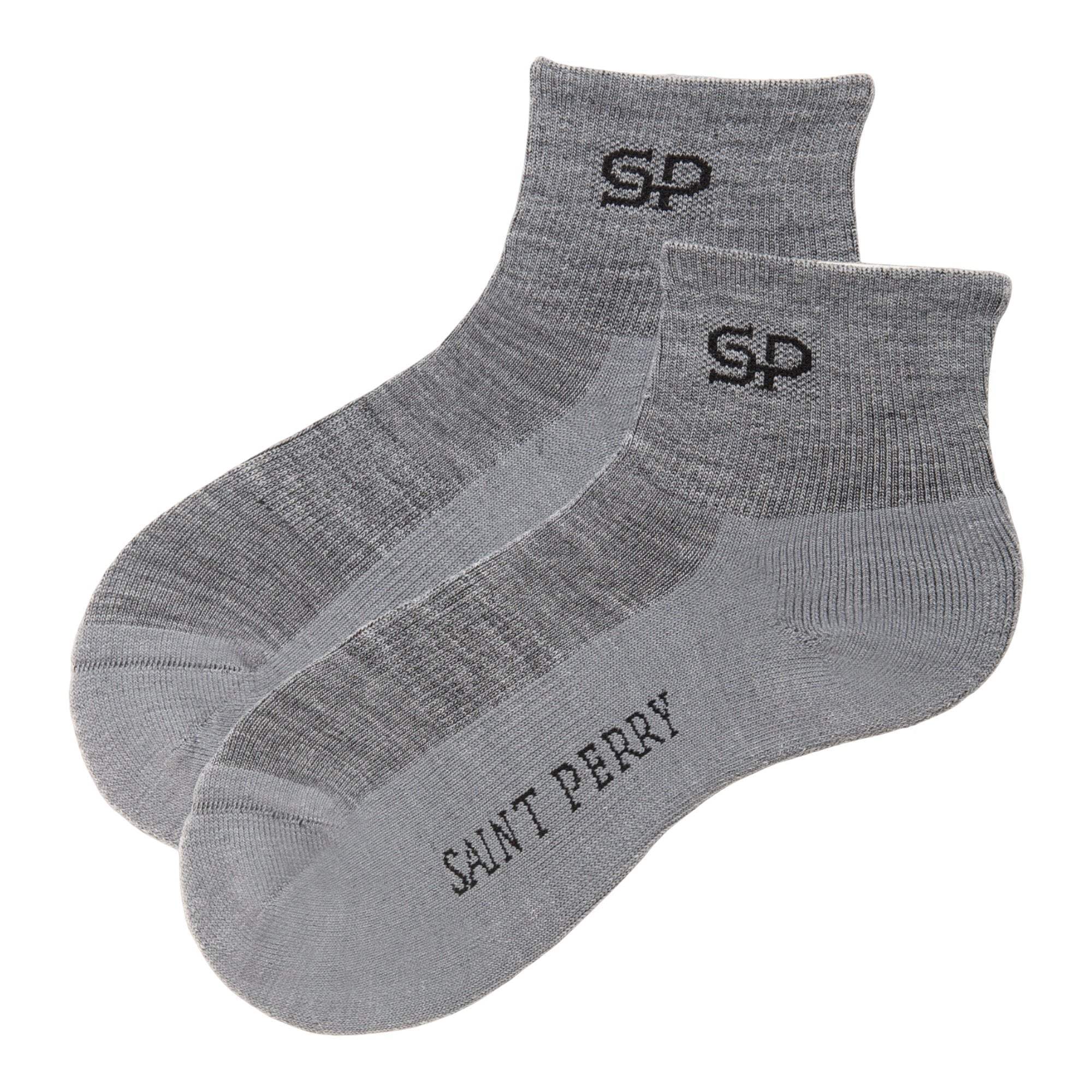 Black, white, and gray Saint Perry mid-rise ankle socks made from wool-cotton blend with ribbed knit for comfort and stretch